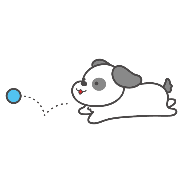 ボールを追いかけて遊ぶ犬