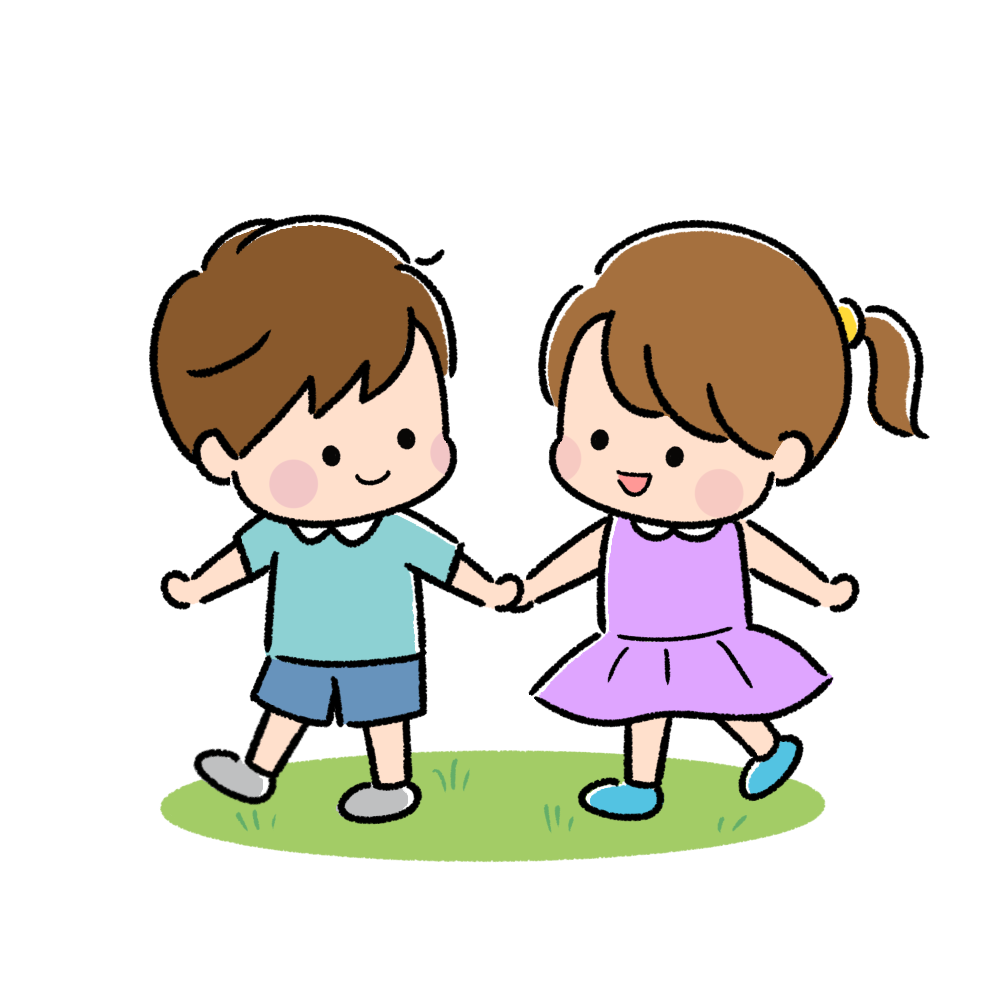 手をつないで散歩をする子ども